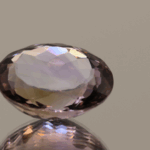 Natural oval cut ametrine gemstone with purple yellow color, 17.90 × 14.50 mm