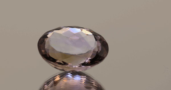 Natural oval cut ametrine gemstone with purple yellow color, 17.90 × 14.50 mm