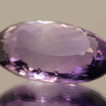 Natural oval cut amethyst gemstone with purple violet color, 23.90 × 16.30 mm