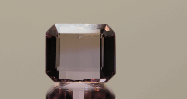 Natural octagon cut ametrine gemstone with purple yellow color, 16.00 × 13.20 mm