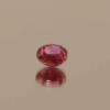Pinkish red ruby stone, 1.38 carat, oval cut, unheated, origin Mozambique, dimensions 6.27 × 5.19 × 4.15 mm. Perfect for rings, pendants, or custom jewelry. AIG certified (GEM20240821119373).