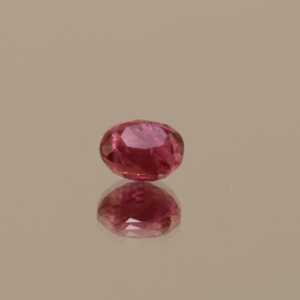 Pinkish red ruby stone, 1.38 carat, oval cut, unheated, origin Mozambique, dimensions 6.27 × 5.19 × 4.15 mm. Perfect for rings, pendants, or custom jewelry. AIG certified (GEM20240821119373).