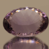 Natural oval cut amethyst gemstone with purple violet color, 18.90 × 13.60 mm