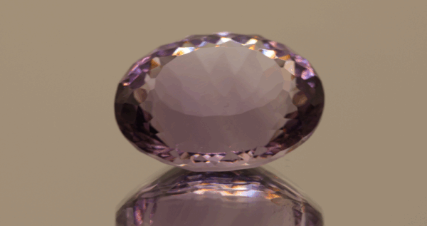 Natural oval cut amethyst gemstone with purple violet color, 18.90 × 13.60 mm