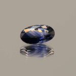 oval-shaped sapphire crystal blue, 1.19 carat, 8.40 × 5.16 × 3.24 mm, heat-treated, unknown origin, AIG certified.