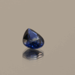 Blue pear-shaped sapphire, 0.77 carat, 6.99 × 5.10 × 2.69 mm, heat-treated, unknown origin, AIG certified.