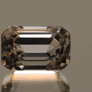 Light yellow octagon-shaped spodumene, 12.14 carat, 14.5 × 9.91 × 9.4 mm, no treatment, unknown origin, HGTL certified.