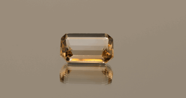 Light brown octagon-shaped topaz, 6.33 carat, 13.1 × 8.5 × 5.2 mm, no treatment, unknown origin.
