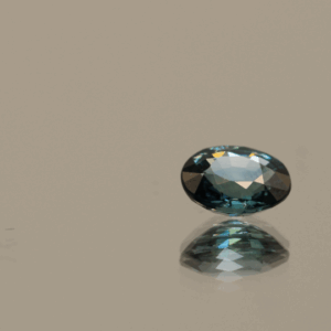 Natural sapphire gemstone, 0.8 carat, oval cut, blue color, heat-treated, loose gemstone, dimensions 6.08 × 5.02 × 3.04 mm, origin Madagascar, AIG certified.