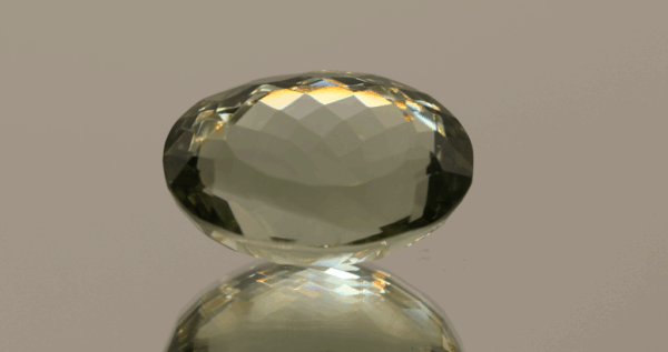 Natural prasiolite gemstone, 21.18 carat, oval cut, pale green color, untreated, loose gemstone, dimensions 20 × 13.6 × 12.1 mm, ideal for fine jewelry.