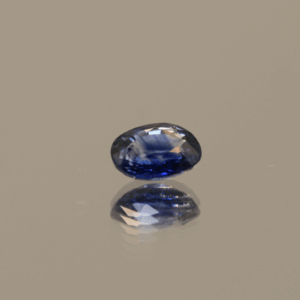 Natural sapphire gemstone, 0.72 carat, oval cut, blue color, heat-treated, loose gemstone, dimensions 5.66 × 4.86 × 2.74 mm, origin unknown, AIG certified.