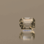 Alt Text: Natural octagon cut aquamarine gemstone with colorless hue, 8.80 × 7.50 mm