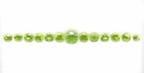 Yellow Peridot Bracelet Set with 13 natural peridots totaling 16.9 carats in cushion cut