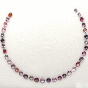 Multicolored Spinel Necklace Set with 34 natural spinels totaling 30 carats in oval cut
