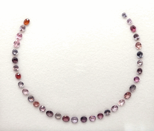 Multicolored Spinel Necklace Set with 34 natural spinels totaling 30 carats in oval cut