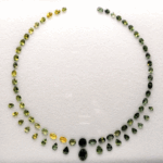Greenish Yellow Sapphire Necklace Set with 65 natural sapphires totaling 50 carats in oval and pear cuts