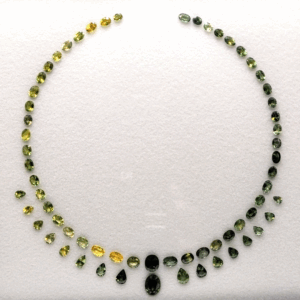 Greenish Yellow Sapphire Necklace Set with 65 natural sapphires totaling 50 carats in oval and pear cuts