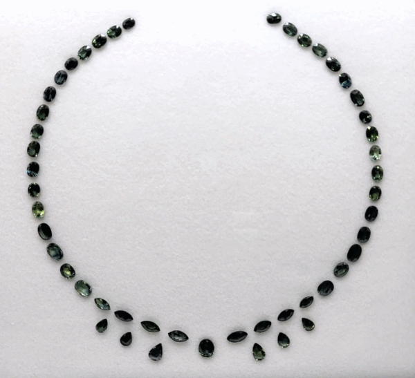 Teal Sapphire Jewelry Necklace Set with 49 natural sapphires totaling 30 carats in oval pear and marquise cuts