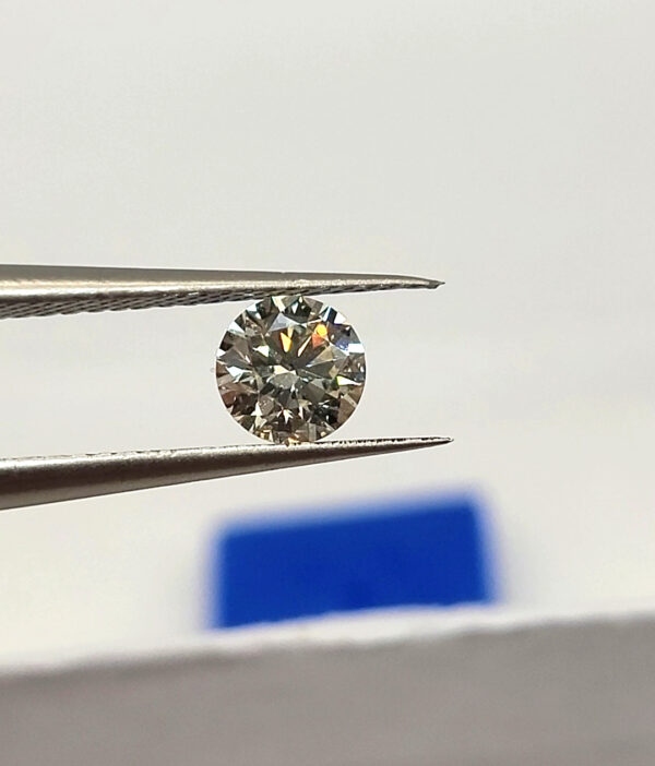 0.42 carat natural diamond IGI certified K color SI1 clarity. For an Engagement Ring