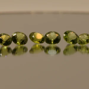 PERIDOT ROUND 13.73 CT