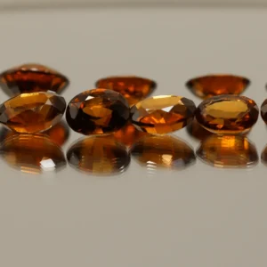 HESSONITE GARNET SET MIXED 23 CT